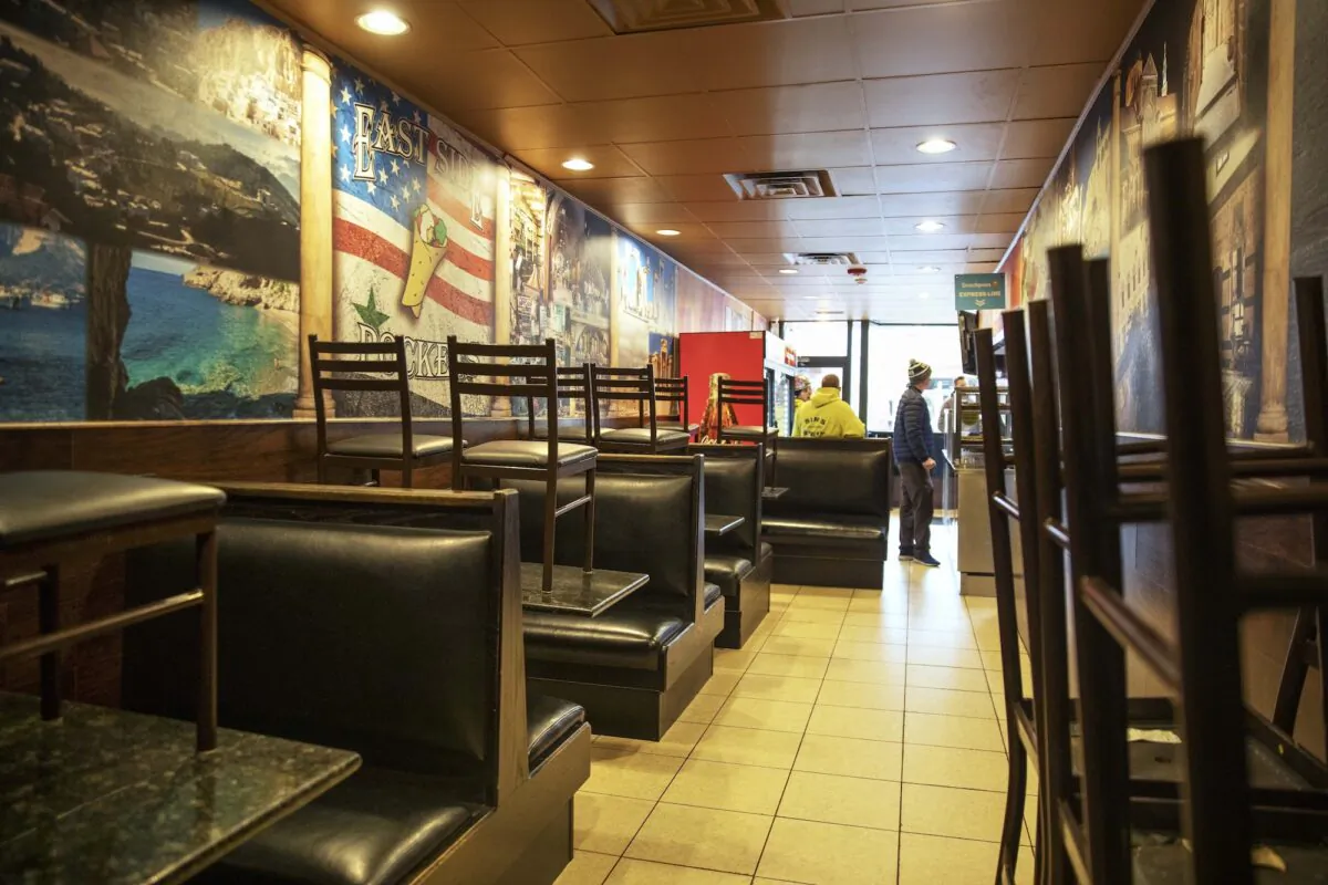 The dining section is closed off at East Side Pockets, a small restaurant in Providence, R.I., on March 25, 2020. (AP Photo/David Goldman)