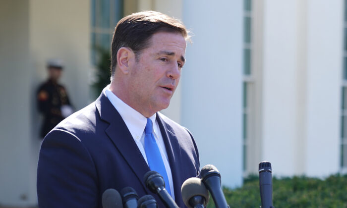 Arizona Gov. Doug Ducey talks to reporters after meeting with President Donald Trump at the White House in Washington on April 3, 2019. (Chip Somodevilla/Getty Images)