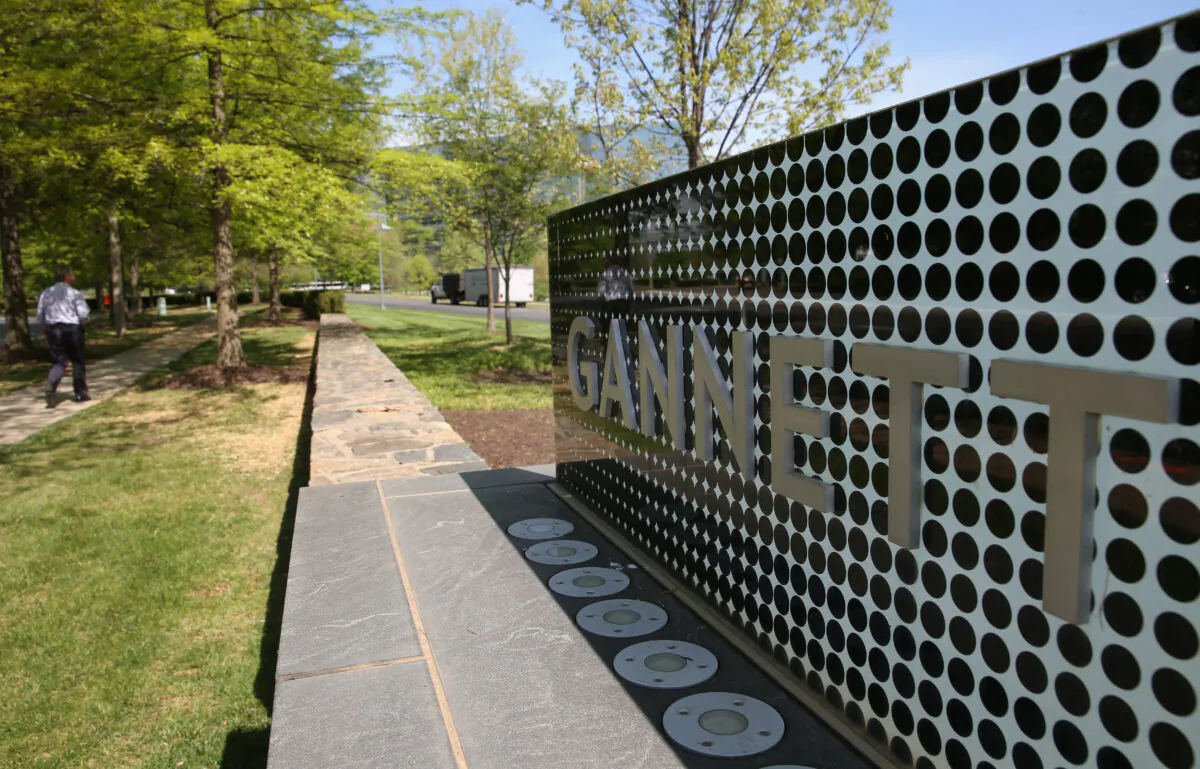 A sign in front of Gannett's headquarters in Tysons Corner, Va., in a file photo. (Mark Wilson/Getty Images)