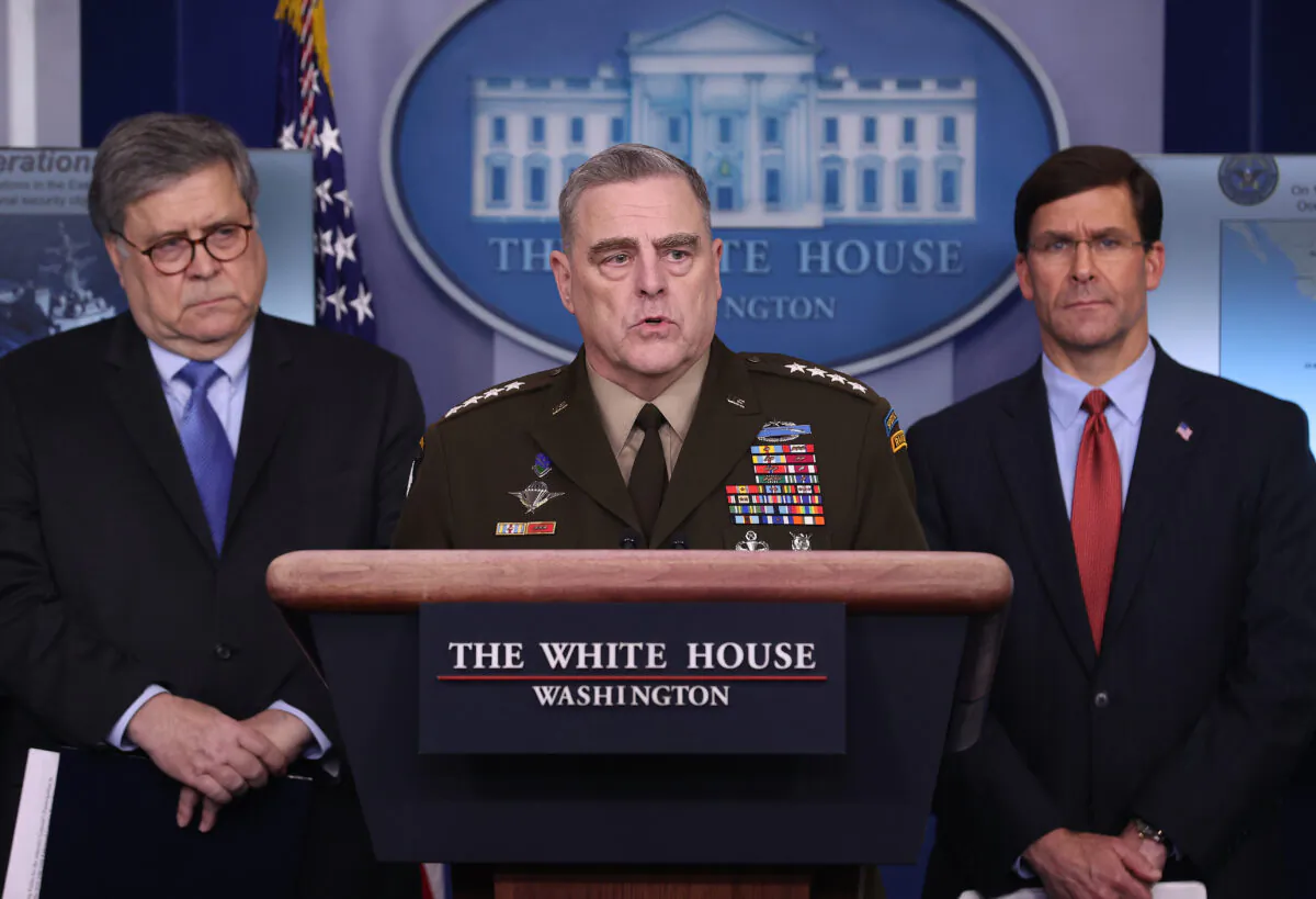 Chairman of the Joint Chiefs of Staff Gen. Mark Milley speaks about military operations during the daily White House coronavirus press briefing flanked by Attorney General William Barr (L) and Defense Secretary Mark Esper in Washington on April 1, 2020. (Win McNamee/Getty Images)
