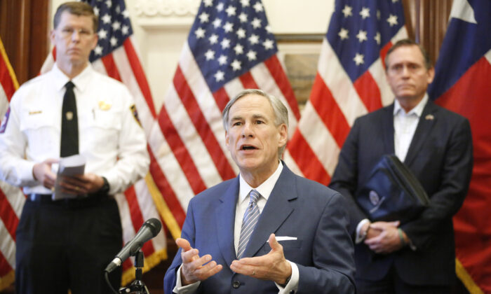 Texas Governor Greg Abbott speaks at a press conference at the Texas State Capitol in Austin in a March 29, 2020, file photograph. (Tom Fox-Pool/Getty Images)