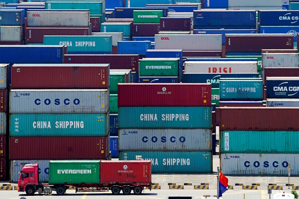 Containers are seen at the Yangshan Deep Water Port in Shanghai, China, on Aug. 6, 2019. (Aly Song/Reuters)