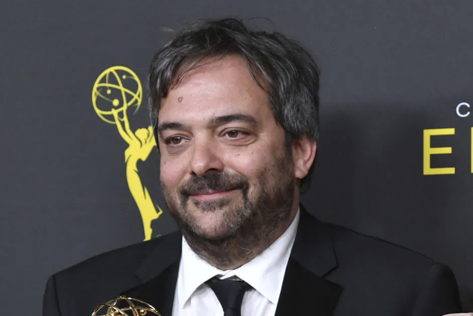 Adam Schlesinger, winner of the awards for outstanding original music and lyrics for "Crazy Ex Girlfriend," in the press room at the Creative Arts Emmy Awards in Los Angeles on Sept. 14, 2019. (Richard Shotwell/Invision/AP, File)