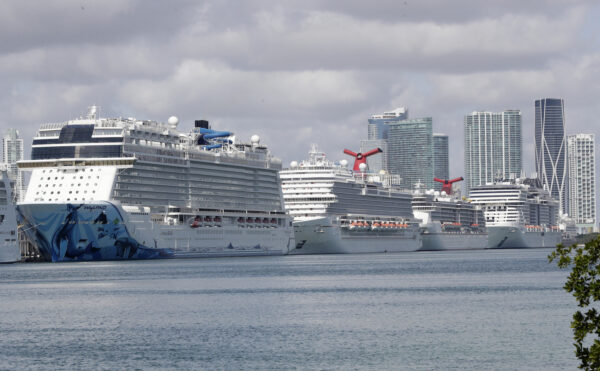 Cruise ships are shown docked at PortMiami
