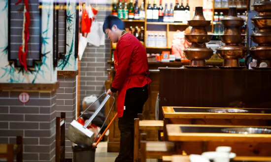China’s Services Activity Shrinks Further in March, Job Cuts Fastest on Record