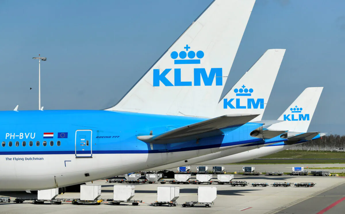 KLM airline airplanes are parked as Schiphol Airport reduces its flights due to the COVID-19 outbreak, in Amsterdam on April 2, 2020. (Piroschka van de Wouw/Reuters)