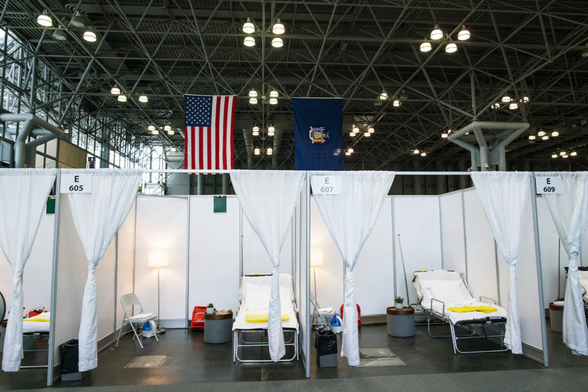 Hospital bed booths are set up at the Jacob K. Javits Convention Center which is being turned into a hospital to help fight COVID-19 cases in New York City on March 27, 2020. (Eduardo Munoz Alvarez/Getty Images)