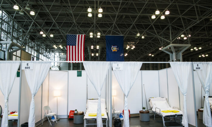 Hospital bed booths are set up at the Jacob K. Javits Convention Center which is being turned into a hospital to help fight COVID-19 cases in New York City on March 27, 2020. (Eduardo Munoz Alvarez/Getty Images)