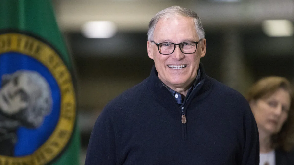 Washington State Governor Jay Inslee and other leaders speak to the press in Seattle, Washington on March 28, 2020. (Karen Ducey/Getty Images)
