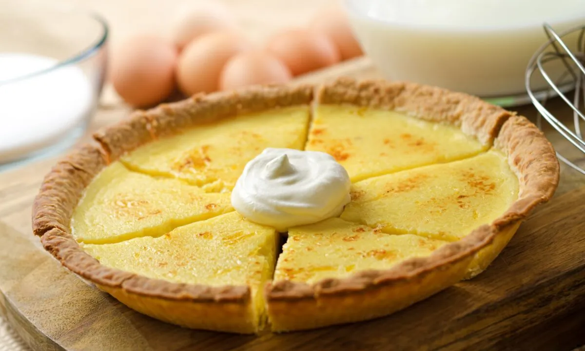 Chess pie, a sweet and rich Southern classic, brings together eggs, butter, sugar, cornmeal, and flour in a crispy crust. (Foodio/Shutterstock)