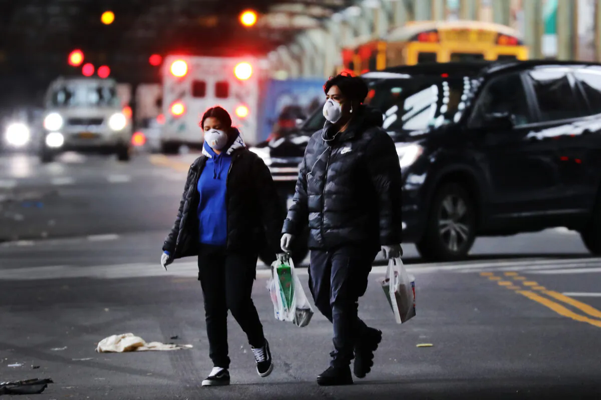 People move through the streets of the Borough Park section of Brooklyn, New York City, on April 3, 2020. (Spencer Platt/Getty Images)