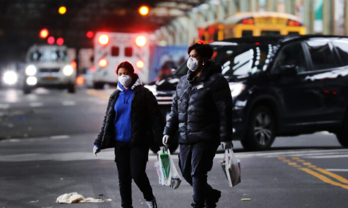 People move through the streets of the Borough Park section of Brooklyn, New York City, on April 3, 2020. (Spencer Platt/Getty Images)