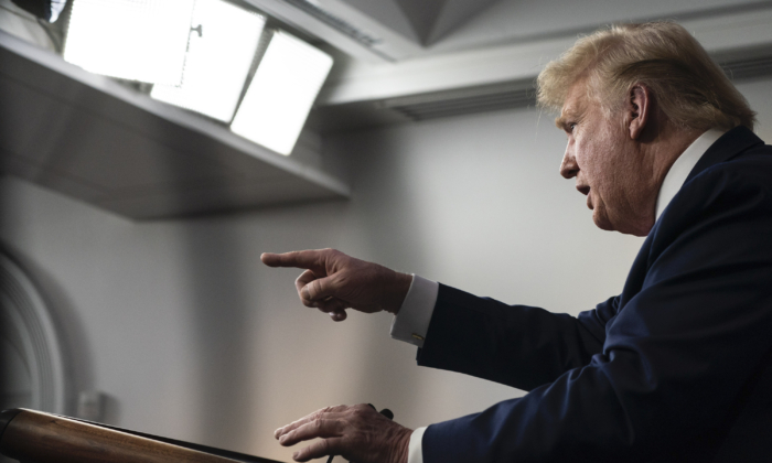 President Donald Trump answers questions in the press briefing room with members of the White House Coronavirus Task Force in Washington on April 4, 2020. (Sarah Silbiger/Getty Images)