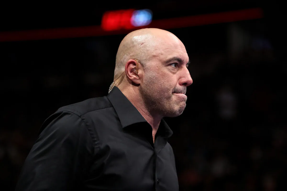 Joe Rogan enters the octagon during the UFC 225: Whittaker v Romero 2 event at the United Center in Chicago, Illinois, on June 9, 2018. (Dylan Buell/Getty Images)