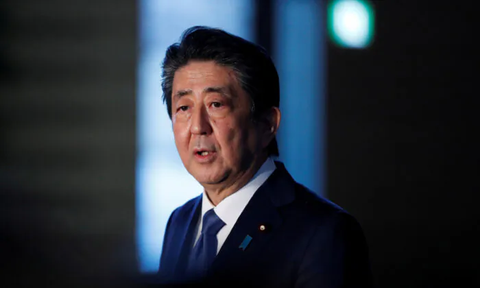 Japan's Prime Minister Shinzo Abe speaks to the media on Japan's response to the CCP virus outbreak, at his official residence in Tokyo, Japan, on April 6, 2020. (Issei Kato/Reuters) 