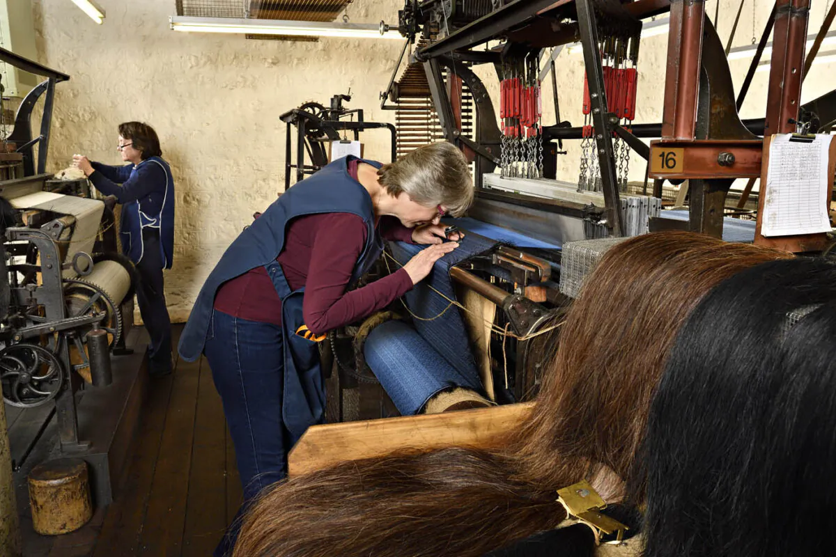 For nearly 150 years, the manufacturing process at John Boyd Textiles Ltd. has remained the same, although the unique looms, patented in 1872, are now powered by electricity. (Rob Scott/John Boyd Textiles Ltd.)