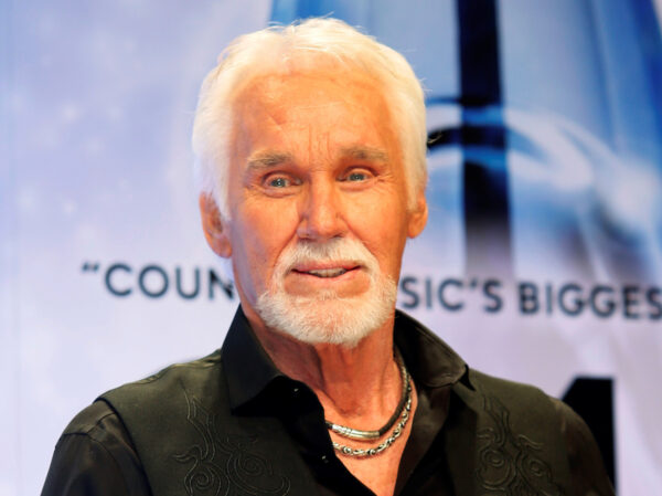 Kenny Rogers poses backstage after accepting the Willie Nelson Lifetime Achievement award
