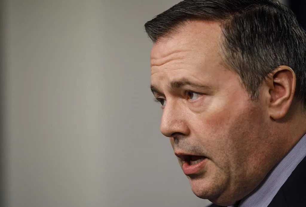 Alberta Premier Jason Kenney updates media on measures taken to help with COVID-19, in Edmonton on Friday, March 20, 2020. (Jason Franson/The Canadian Press)