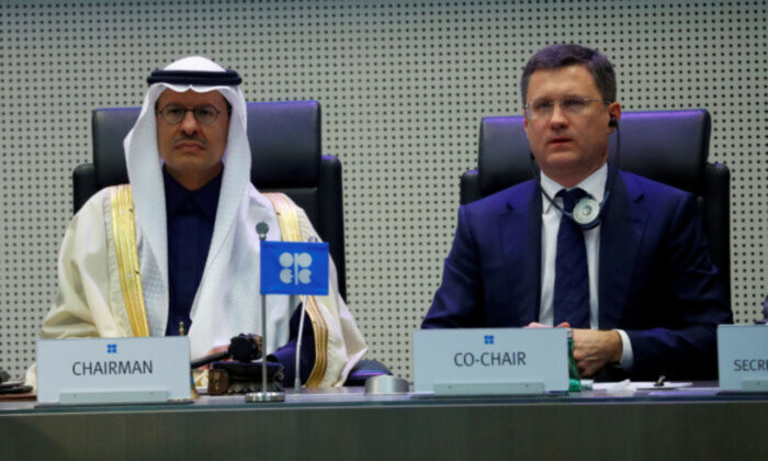 Saudi Arabia's Minister of Energy Prince Abdulaziz bin Salman Al-Saud and Russia's Energy Minister Alexander Novak are seen at the beginning of an OPEC and Non-OPEC meeting in Vienna, Austria on Dec. 6, 2019. (Leonhard Foeger/Reuters)