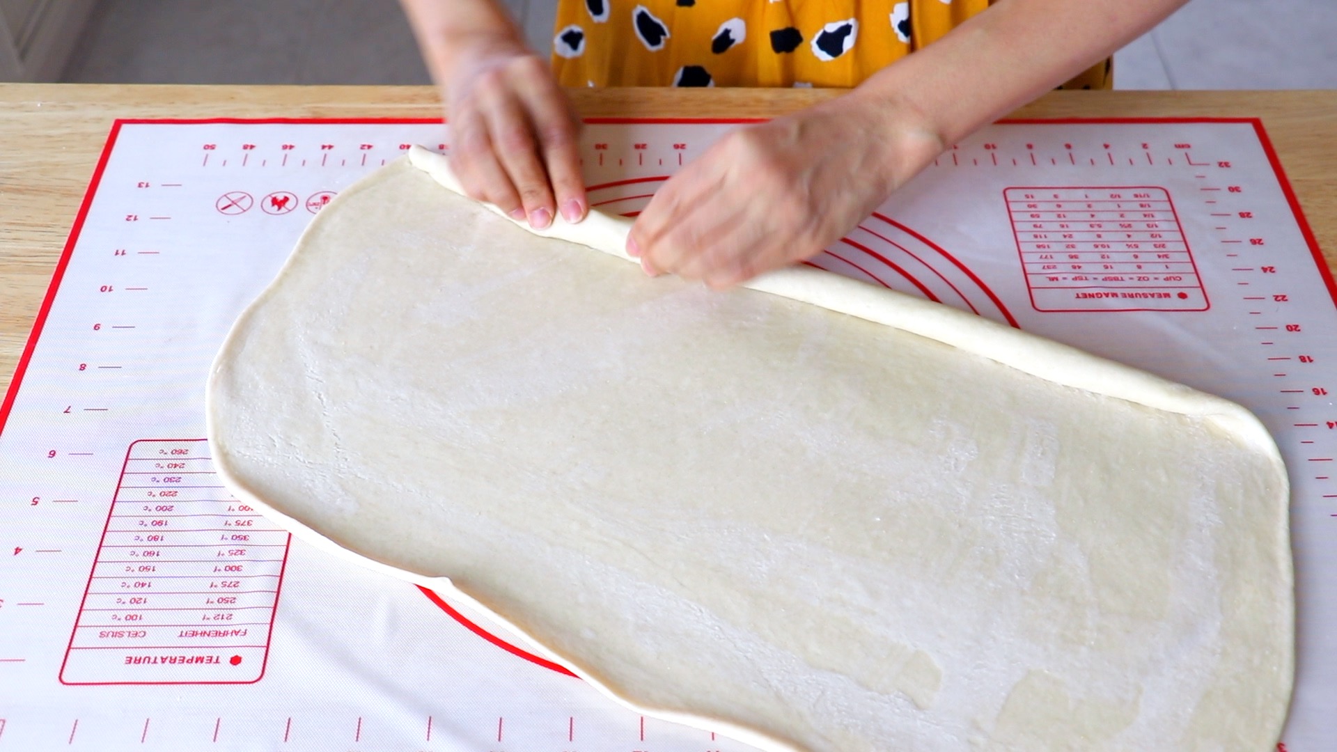 rolling dough into log