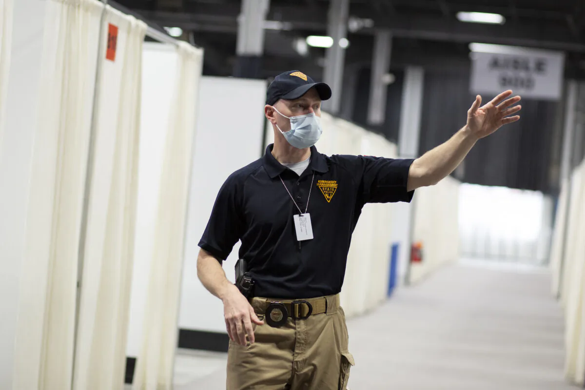 Incident Commander Marc Pellegrino talks to media inside a field medical station in Edison, New Jersey, on April 8, 2020. (Kena Betancur/Getty Images)