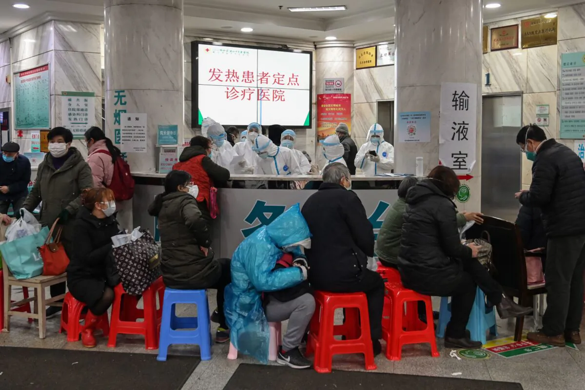 Patients wait for treatment at Wuhan Red Cross Hospital in Wuhan, China on Jan. 24, 2020. (Hector Retamal/AFP via Getty Images)