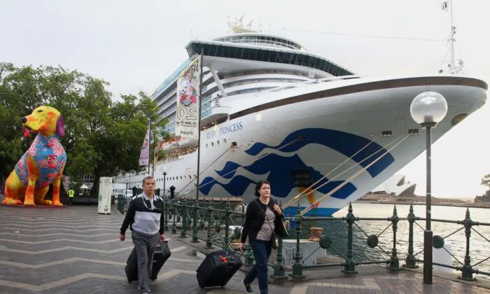 Passengers disembark from the Ruby Princess at Overseas Passenger Terminal on February 8 in Sydney, Australia. (Lisa Maree Williams/Getty Images)