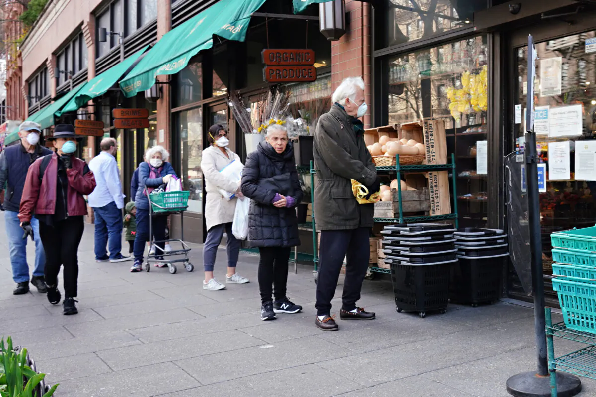 People line up to get into a grocery store during the coronavirus pandemic in New York City on April 07, 2020. (Cindy Ord/Getty Images)