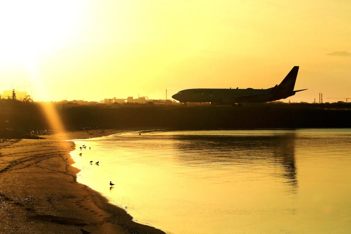 File photo of a plane landing at Sydney airport in Sydney, Australia on March 25, 2020. (Mark Evans/Getty Images)