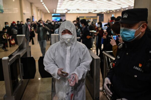A man arrives at Hankou Railway Station in Wuhan