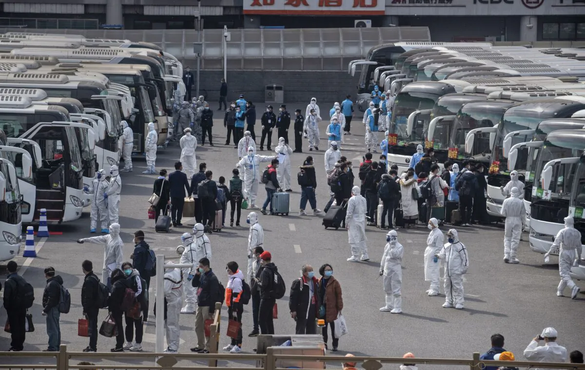 People in Wuhan are waiting for the 14-day quarantine arrangement after they arrive in Beijing, China, on April 8, 2020. (Kevin Frayer/Getty Images)