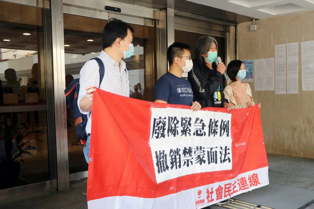Hong Kong pro-democracy veteran Leung Kwok-hung speaks to members of the media before the Court of Appeal's ruling on the anti-mask law in Hong Kong, China, on April 9, 2020. (Jessie Pang/Reuters)