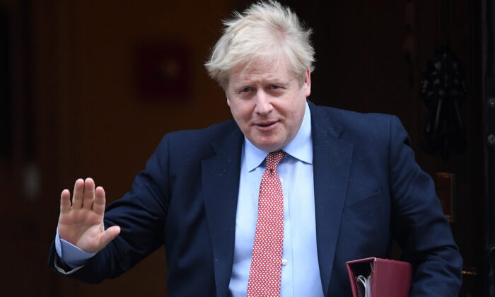 Prime Minister Boris Johnson leaves 10 Downing Street for PMQ's in London, England, on March 25, 2020. (Peter Summers/Getty Images)