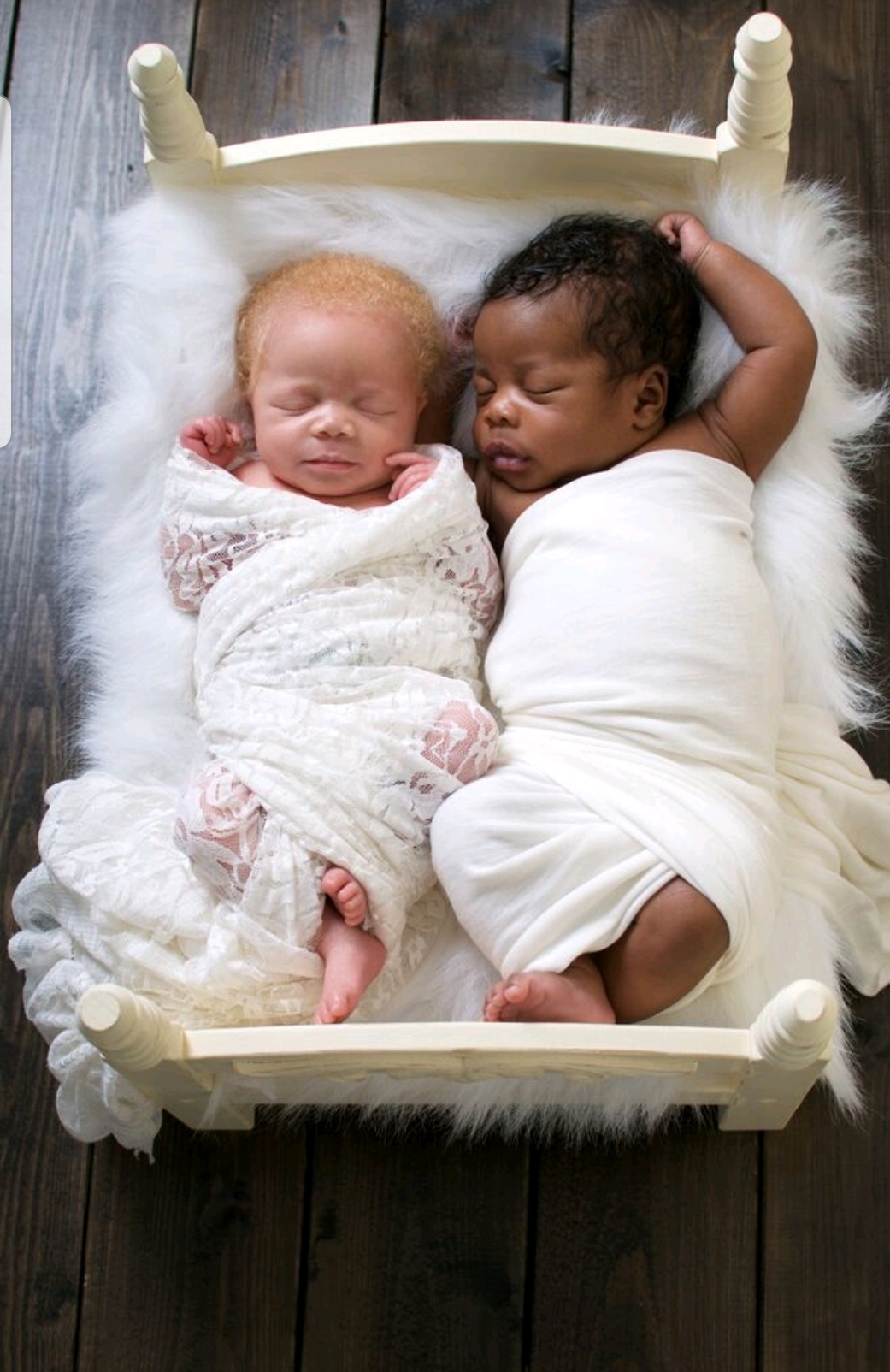 Twin babies one 2024 black one white