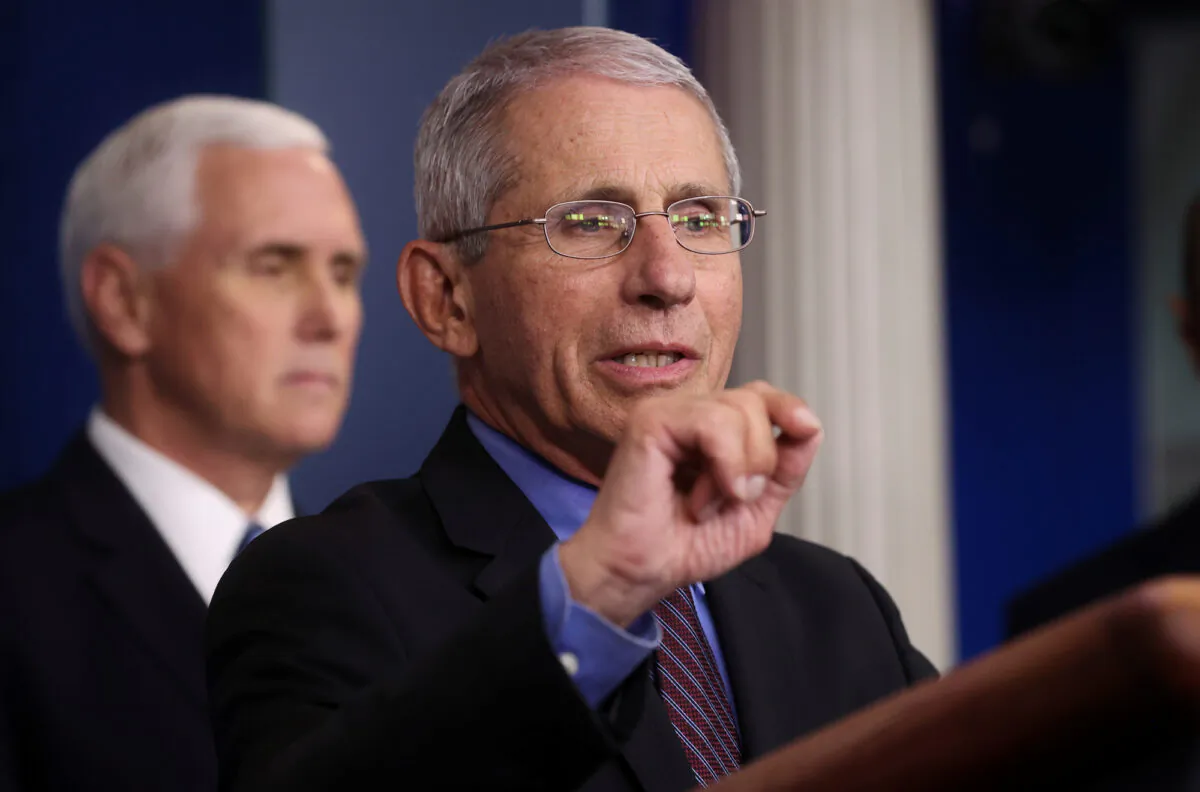 National Institute of Allergy and Infectious Diseases Director Dr. Anthony Fauci answers a question during the daily CCP virus task force briefing as Vice President Mike Pence listens at the White House in Washington on April 9, 2020. (Reuters/Jonathan Ernst)