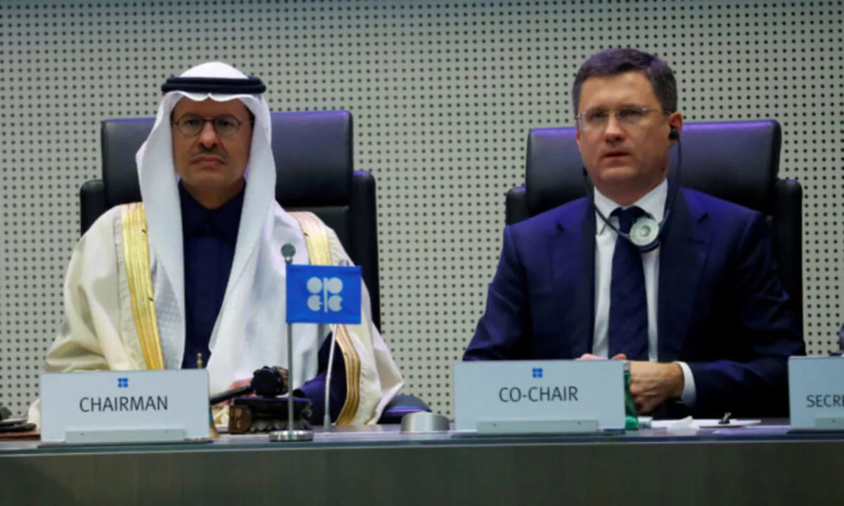 Saudi Arabia's Minister of Energy, Prince Abdulaziz bin Salman Al-Saud, and Russia's Energy Minister, Alexander Novak, are seen at the beginning of an OPEC and Non-OPEC meeting in Vienna, Austria on Dec. 6, 2019. (Leonhard Foeger/Reuters)