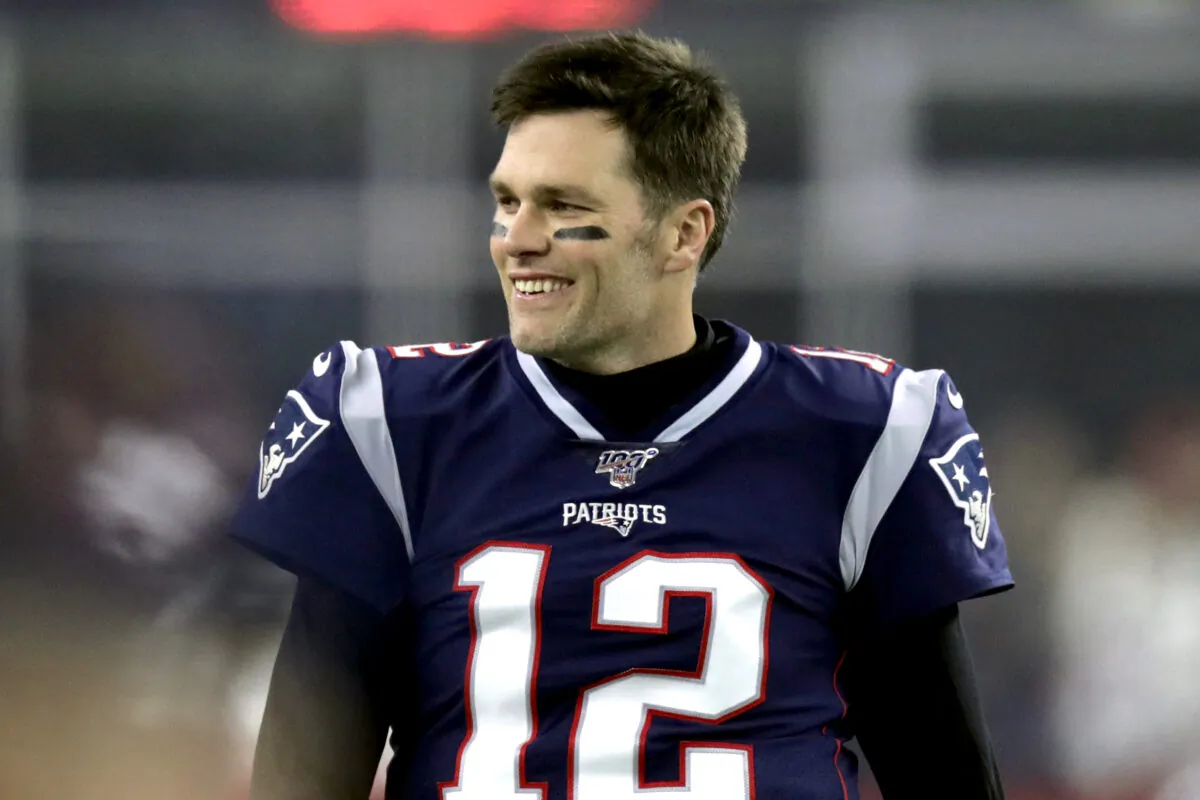 New England Patriots quarterback Tom Brady walks on the field before an NFL wild-card playoff football game against the Tennessee Titans, in Foxborough, Mass., on Jan. 4, 2020. (Charles Krupa/AP Photo)