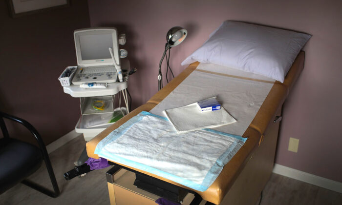 An ultrasound machine sits next to an exam table in an examination room at abortion provider Whole Woman's Health of South Bend in South Bend, Indiana, on June 19, 2019. (Scott Olson/Getty Images)