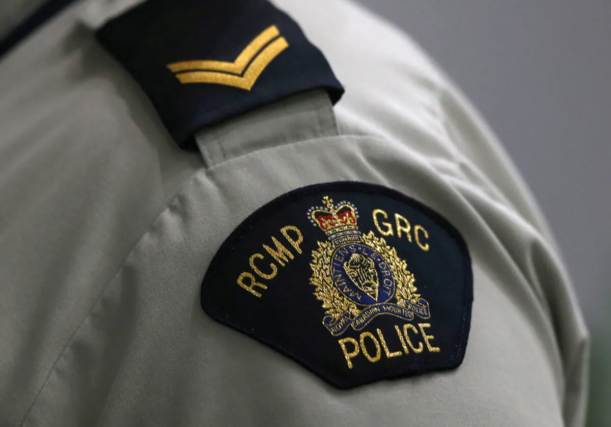 A Royal Canadian Mounted Police (RCMP) crest is seen on a member's uniform, at the RCMP "D" Division Headquarters in Winnipeg, Manitoba Canada on July 24, 2019. (Shannon VanRaes/File Photo via Reuters)