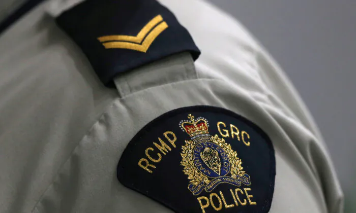 A Royal Canadian Mounted Police crest is seen on a member's uniform at the RCMP "D" Division Headquarters in Winnipeg, Manitoba Canada on July 24, 2019. (Shannon VanRaes/File Photo via Reuters)