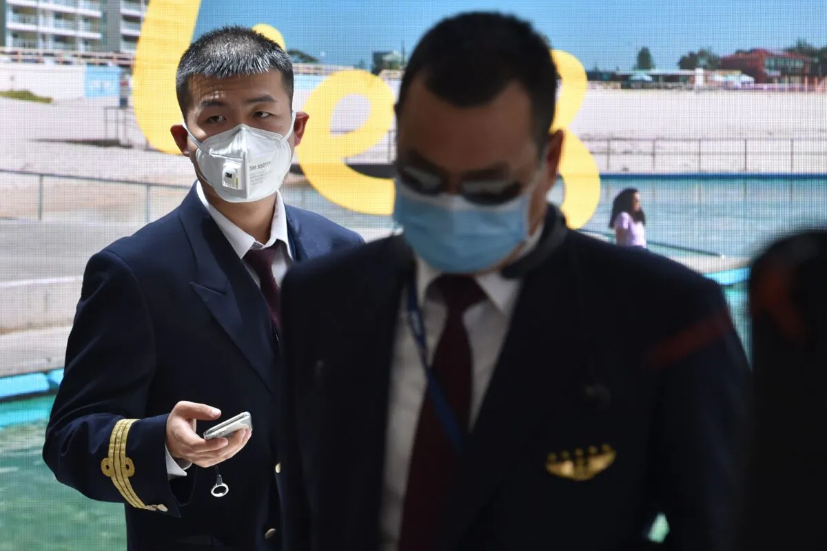 A China Eastern Airlines pilot arrives at Sydney airport after flying a plane from the Chinese city of Wuhan on January 23, 2020. (Peter Parks/AFP via Getty Images)