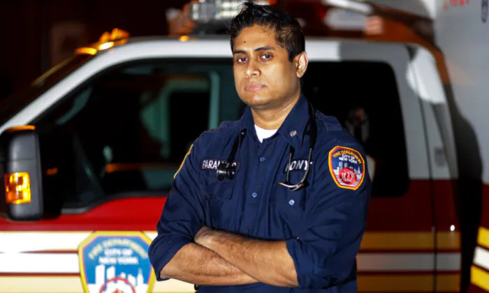 New York City Fire Department paramedic Ravi Kailayanathan poses for a portrait in New York, on April 8, 2020. (Frank Franklin II/AP Photo) 