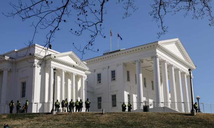 Virginia State Police stand guard after gun rights advocates took part in a rally at the Virginia State Capitol in Richmond, Va., on Jan. 20, 2020. (Samira Bouaou/The Epoch Times)