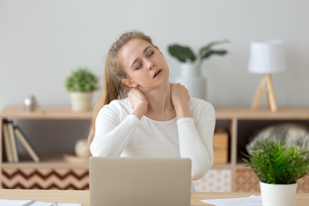 The trapezius muscles at the top of your shoulders are a frequent spot for muscle knots, a by-product of too much computer time or too much stress. (fizkes/Shutterstock)