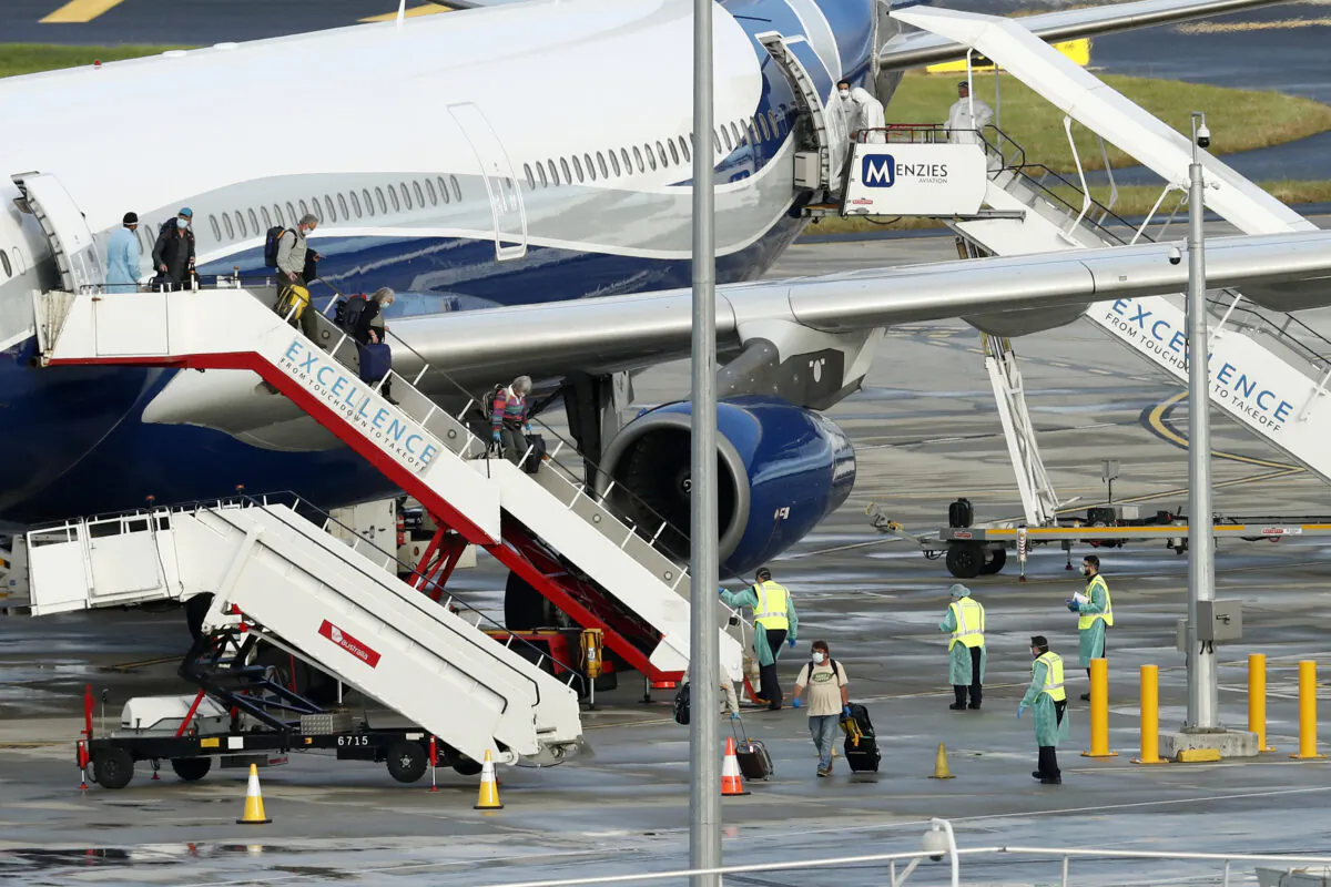 Over 1000 passengers arriving from Peru, Uruguay and India on April 12, 2020. (Darrian Traynor/Getty Images)