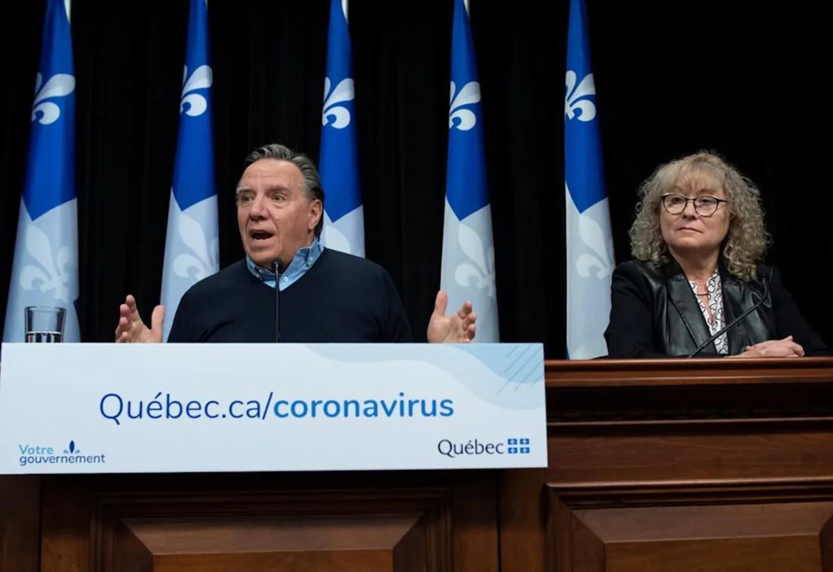 Quebec Premier Francois Legault responds to reporters during a news conference on the COVID-19 pandemic at the legislature in Quebec City on April 13, 2020. (Jacques Boissinot/The Canadian Press)