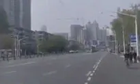 Wuhan Girl Seen Crying on Deserted Street