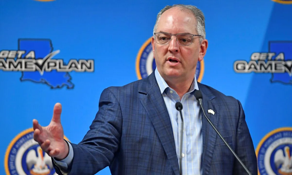 Louisiana Gov. John Bel Edwards gives an update on the spread of CCP virus in the state of La., at GOHSEP in Baton Rouge, La, on April 9, 2020, (Hilary Scheinuk/The Advocate via AP)