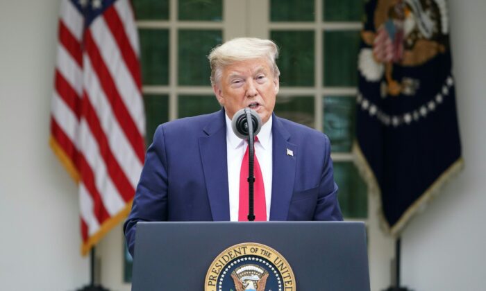 President Donald Trump speaks during the daily briefing on the CCP virus, which causes COVID-19, in the Rose Garden of the White House on April 14, 2020. (Mandel Ngan/AFP via Getty Images)