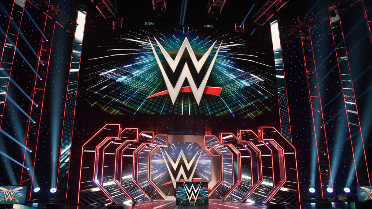 WWE logos are shown on screens before a WWE news conference at T-Mobile Arena on Oct. 11, 2019 in Las Vegas, Nev. (Ethan Miller/Getty Images)